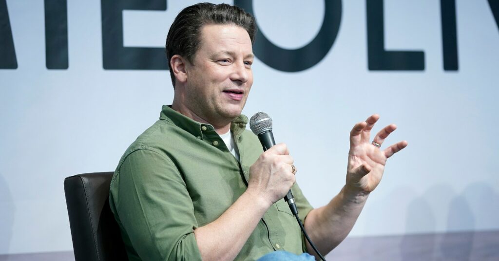 Jamie Oliver speaking on stage