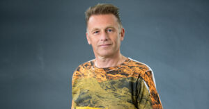 Photo features animal rights advocate Chris Packham, who says egg cartons are misleading.
