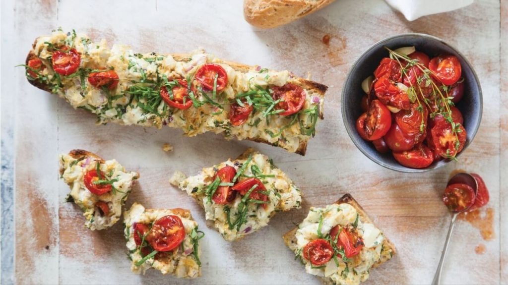 Loaded French Bread Vegan Pizza With Artichokes, Hearts of Palm, & Roasted Tomatoes