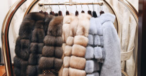 Photo shows a rack of fur coats. Ireland's fur farm ban has been approved by the Cabinet, and the government has agreed to compensate the farms who will have to shut.