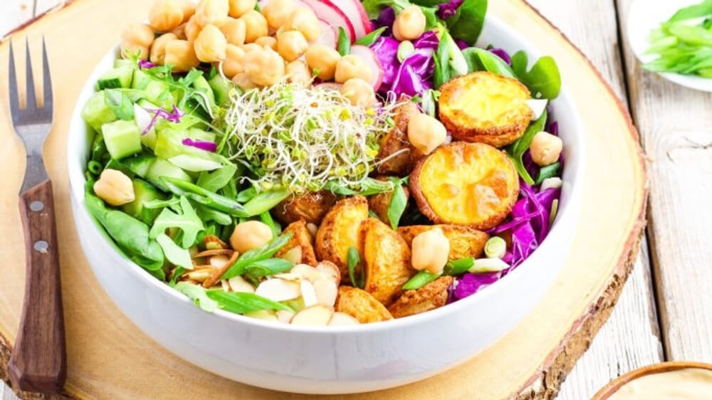 Simple and Satisfying Vegan Salad Bowl With Potatoes and Tahini Dressing