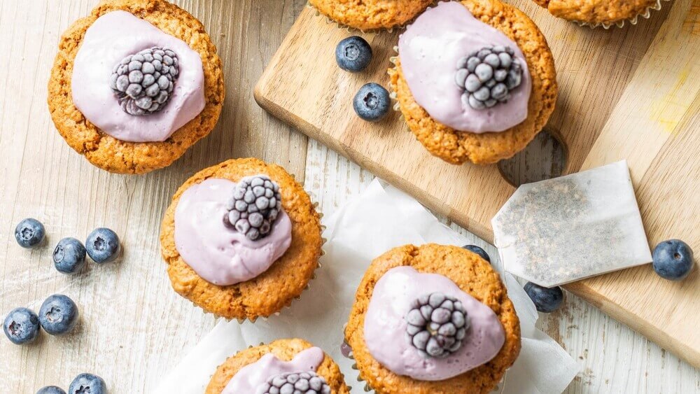 Vegan Spelt Muffins With Blackberry Coconut Frosting