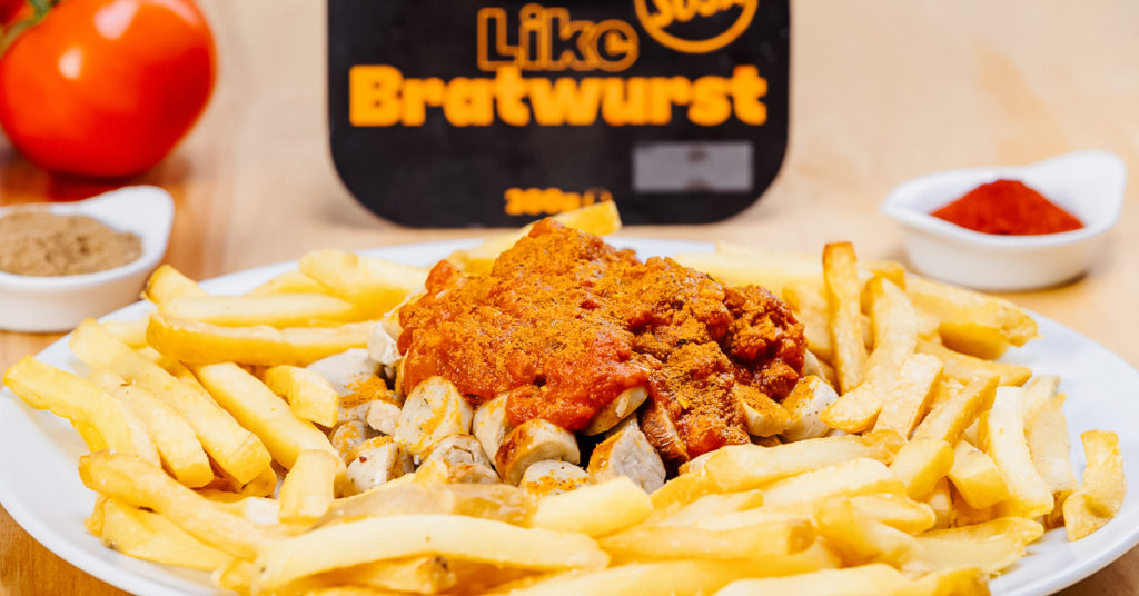 Vegan Brats and Fries With Currywurst Sauce