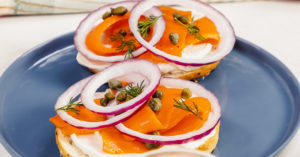 This homemade bagel features vegan salmon and dairy-free cream cheese. | LIVEKINDLY