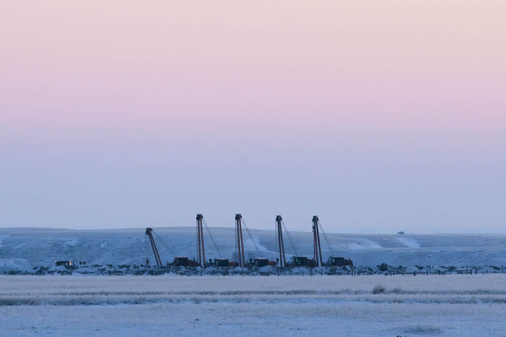 Photo of the machinery lining the Keystone pipeline's right of way in Alberta, Canada.