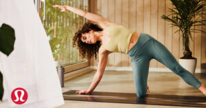 Photo features someone practising yoga wearing Lululemon athleisure clothes. Lululemon is launching plant-based leggings.