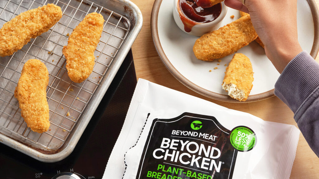 Beyond Meat's vegan chicken tenders on a plate and baking sheet