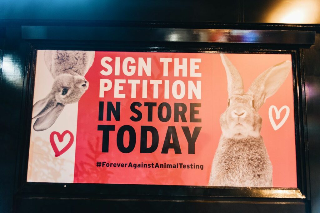 A poster asking customers to sign a petition against animal testing.