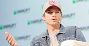 Photo of Ashton Kutcher giving a speech at a conference.