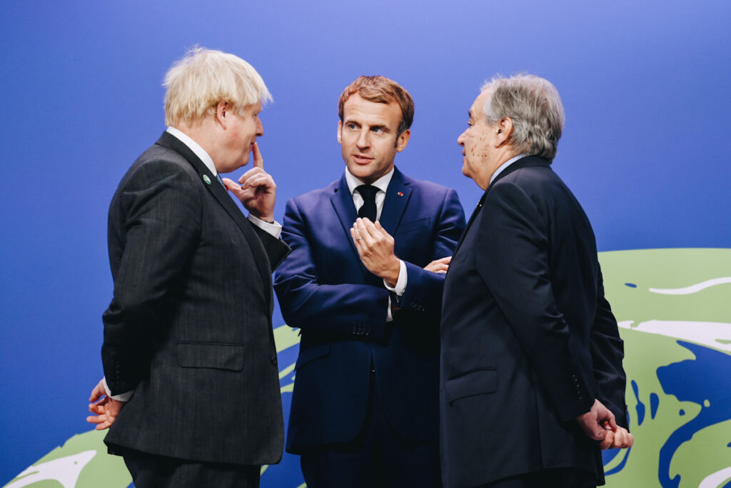 Photo shows Prime Minister Boris Johnson (left), President Emmanual Macron (center), and and UN Secretary-General Antonio Guterres (right). Following the conclusion of COP26, over 200 countries signed the Glasgow Climate Pact.