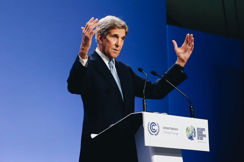 Photo shows U.S. special presidential envoy for climate John Kerry speaking at COP26.