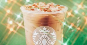 Photo shows the the Sugar Cookie Almondmilk Latte, a festive vegan drink from Starbucks' new holiday menu.