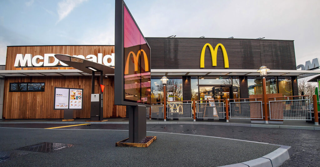Photo shows the new net-zero McDonald's restaurant complete with golden arches logo.
