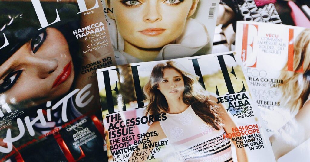 a pile of Elle magazines