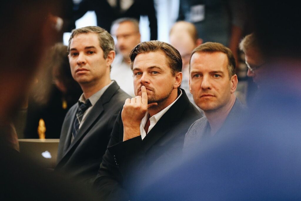 Photo shows Leonardo DiCaprio in a crowd at an NYC climate conference
