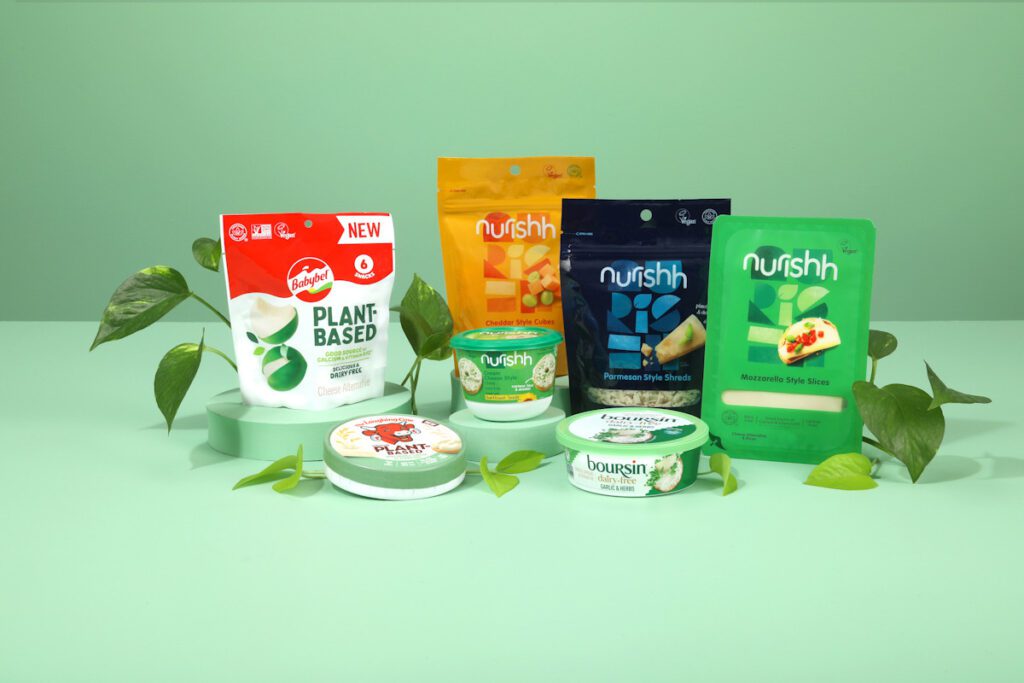 Photo shows the range of vegan cheese brands and items produced by Bel Brands, including Babybel, Laughing Cow, Nurishh, and Boursin.