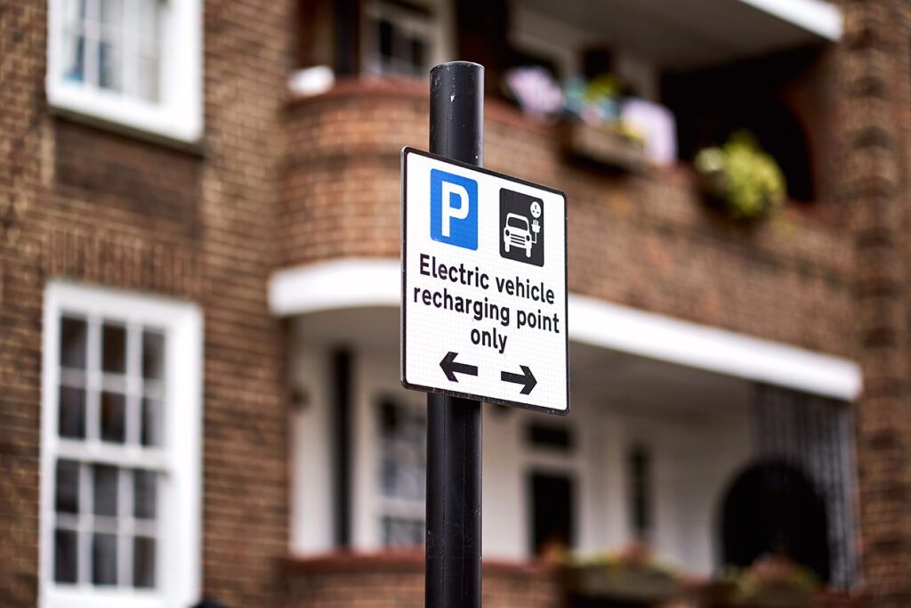 Photo shows a sign for public EV charge points in the UK.