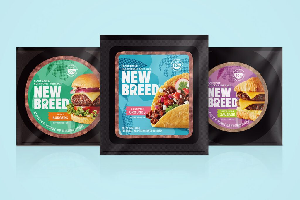 Photo shows three of the New Breed plant-based meat products on a pale blue background.
